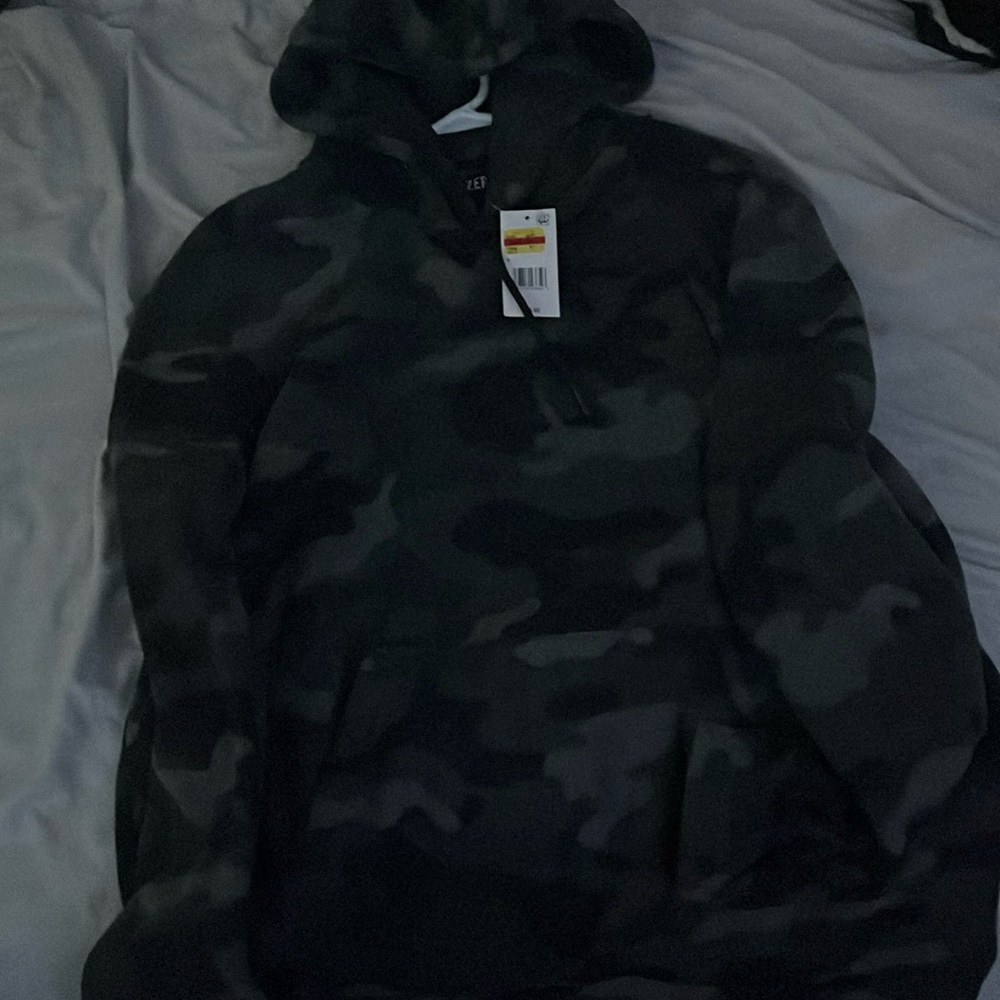 a grey camouflage hoodie